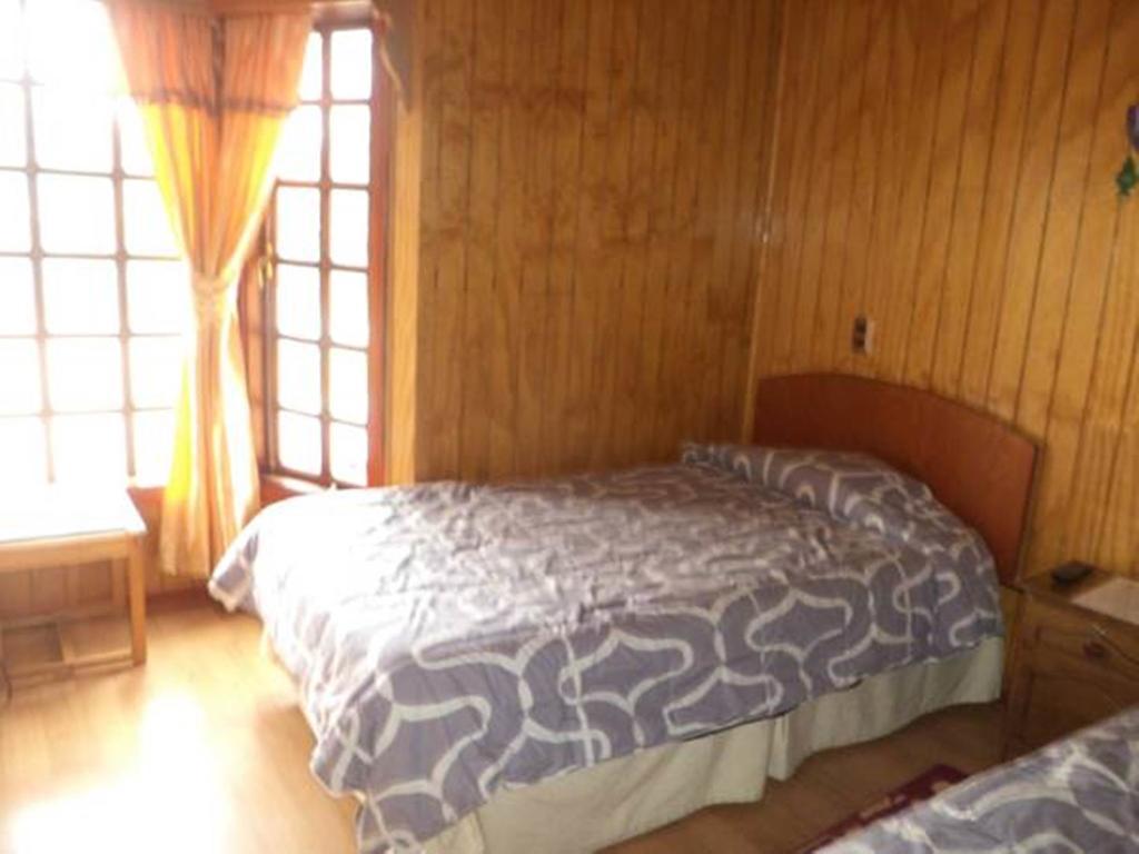 Hostal Lagunitas بويرتو مونت الغرفة الصورة