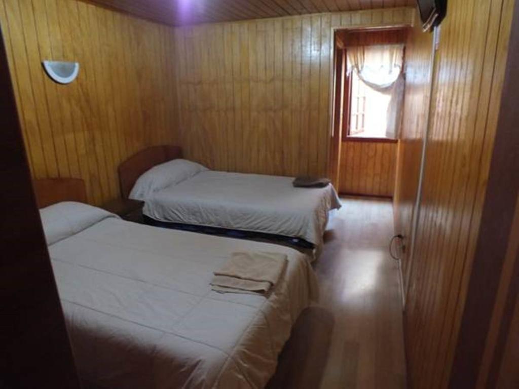 Hostal Lagunitas بويرتو مونت الغرفة الصورة